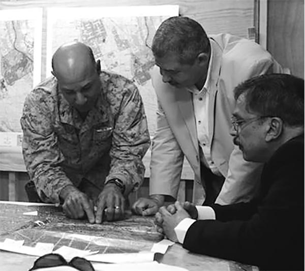 MNC-I and Iraqi government officials discuss security plans associated with the January 2005 elections.